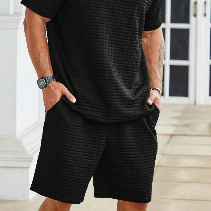 Mens oversized checkered summer casual shorts are fashionable loose breathable and quick drying mens clothing shorts 250220