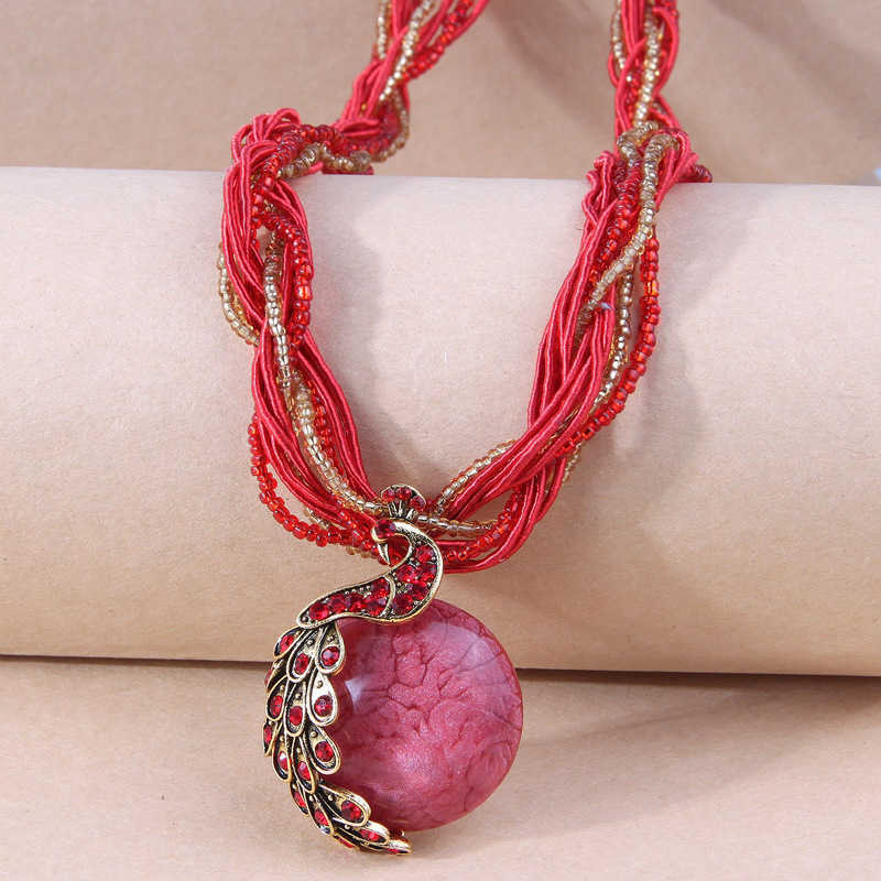 Pendant Necklaces Bohemian style tassel peacock temperament womens rice bead necklace sweater chain H25219