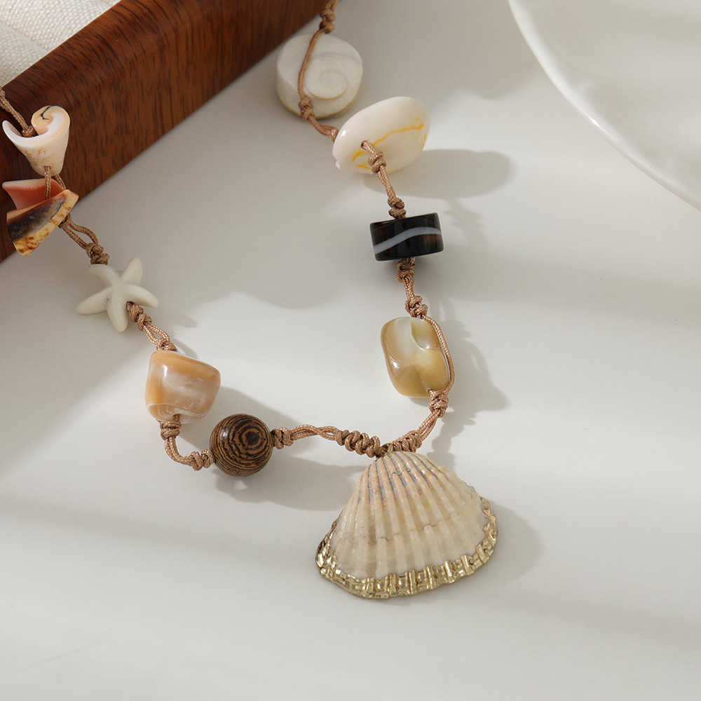 Charm Bracelets Seaside vacation collarbone chain Bohemian style handmade pendant woven rope exotic style natural shell necklace accessories H25220 1 