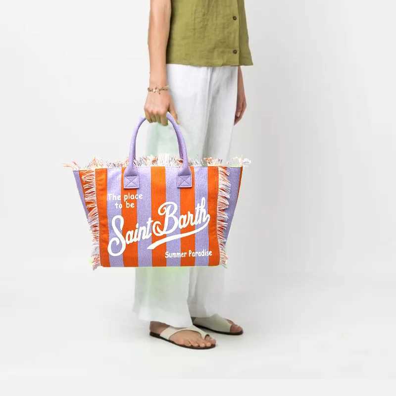 SAINT BARTH2024 New Commuter Practical New womens high-capacity leisure tourism canvas striped handmade tassel handbag tote bag Z250219