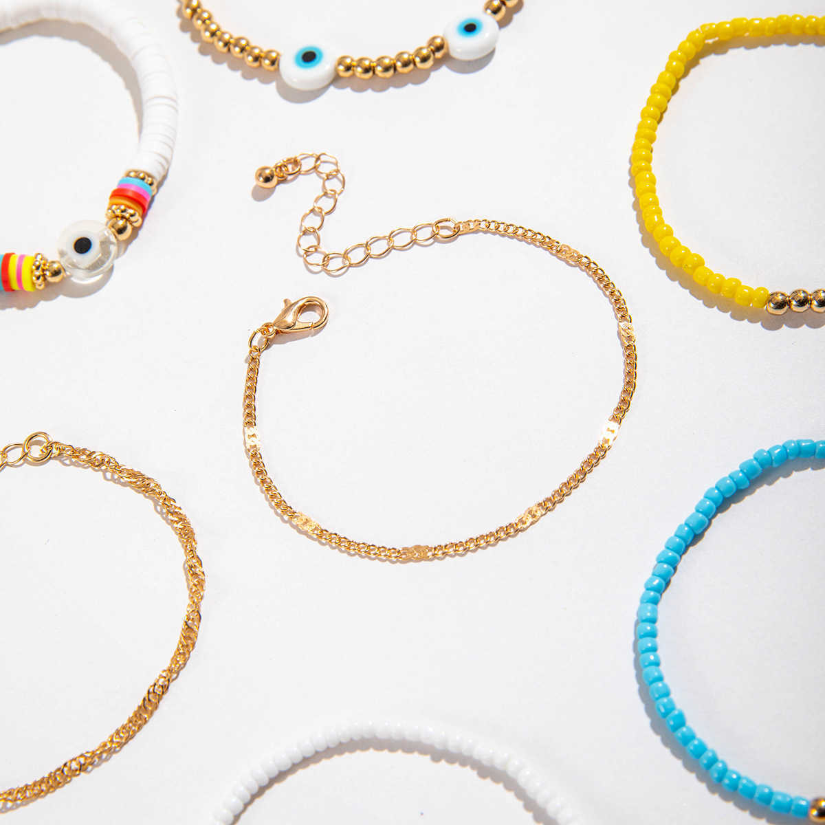 Charm Bracelets Bohemian style colorful rice bead eye ten piece bracelet dopamine elastic bracelet set for women H25220
