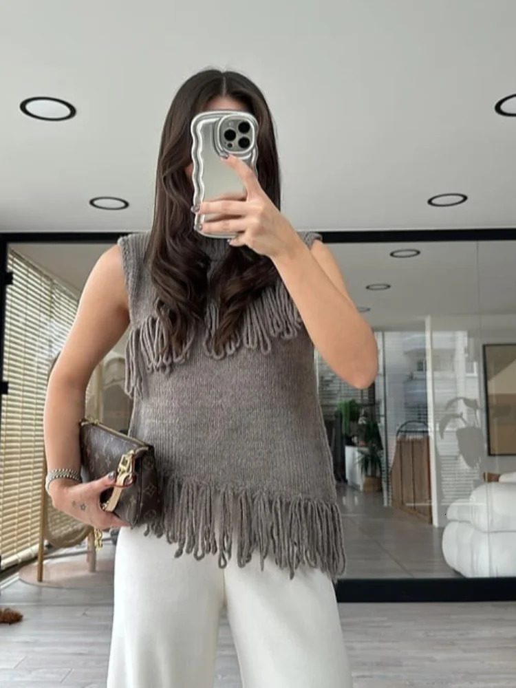 Leisure tassel knitted womens vest sleeveless turtle neck womens vest splicing work spring elegant ultra-thin irregular womens knitting 250218
