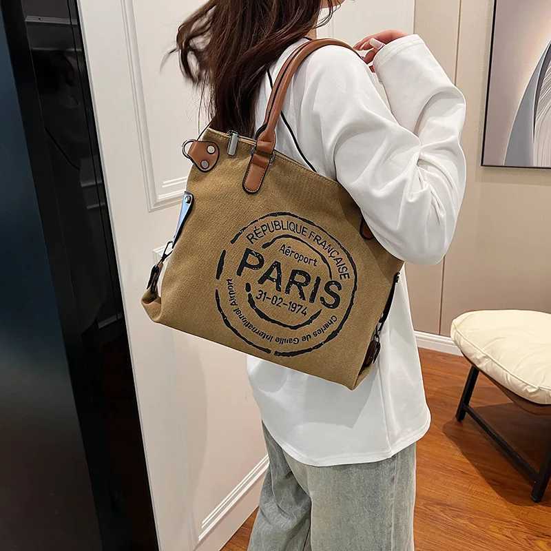 2024 new handheld womens bag trendy fashion letter casual commuting large capacity single shoulder oblique span Y250218