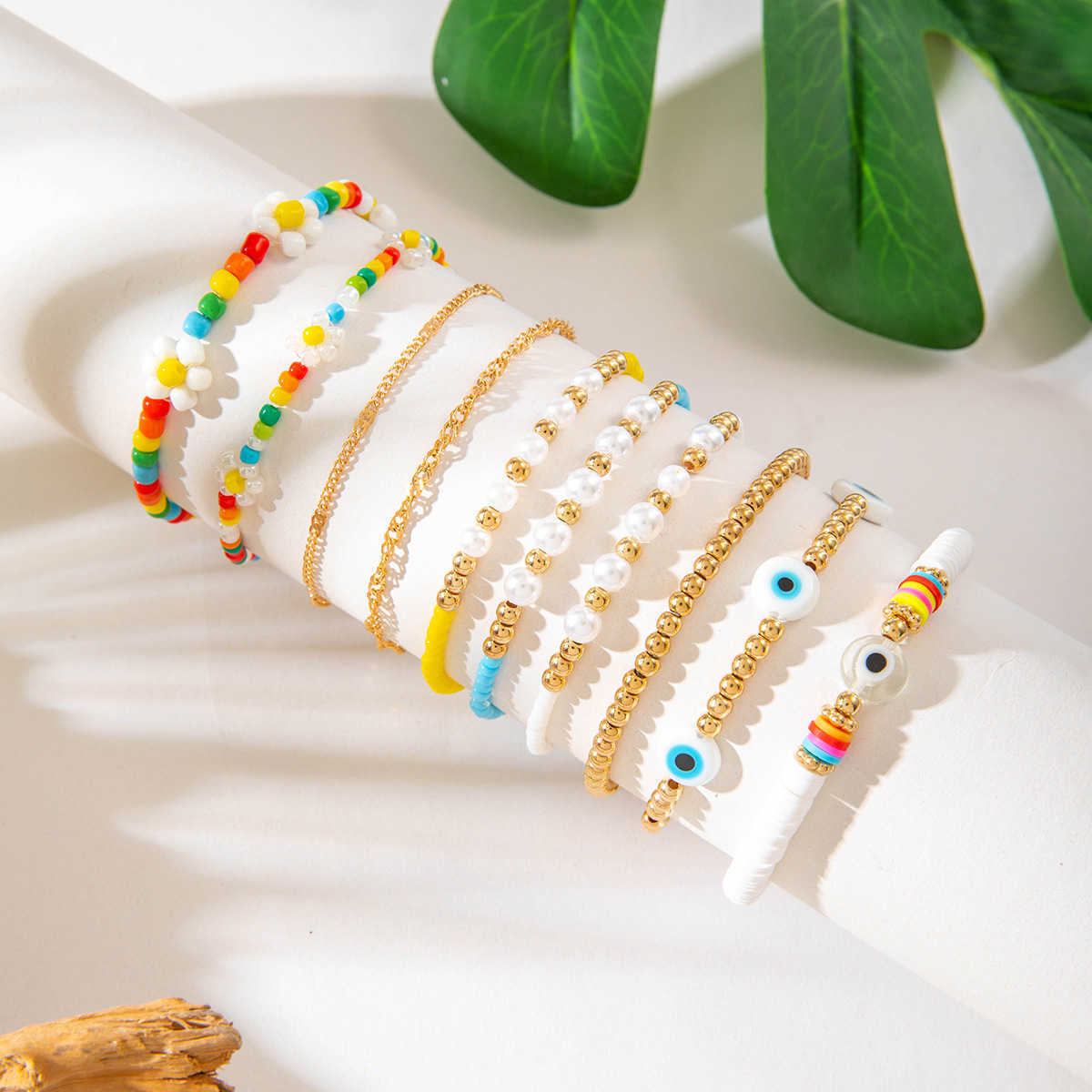 Charm Bracelets Bohemian style colorful rice bead eye ten piece bracelet dopamine elastic bracelet set for women H25220