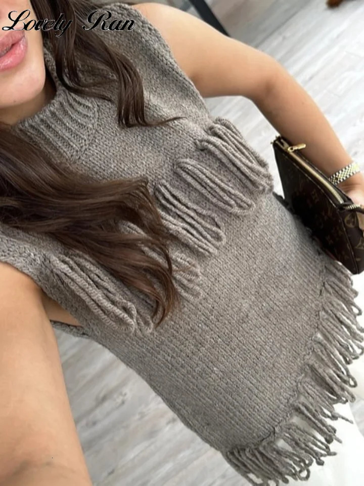 Leisure tassel knitted womens vest sleeveless turtle neck womens vest splicing work spring elegant ultra-thin irregular womens knitting 250218