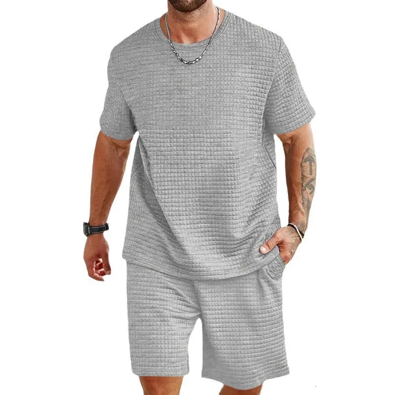 Mens oversized checkered summer casual shorts are fashionable loose breathable and quick drying mens clothing shorts 250220