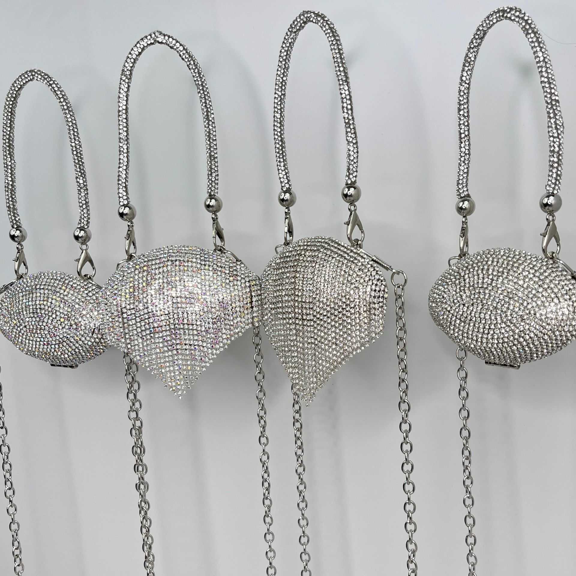 fashion trend metal inlaid diamond shell bag niche design decorative diagonal chain handbag 250215