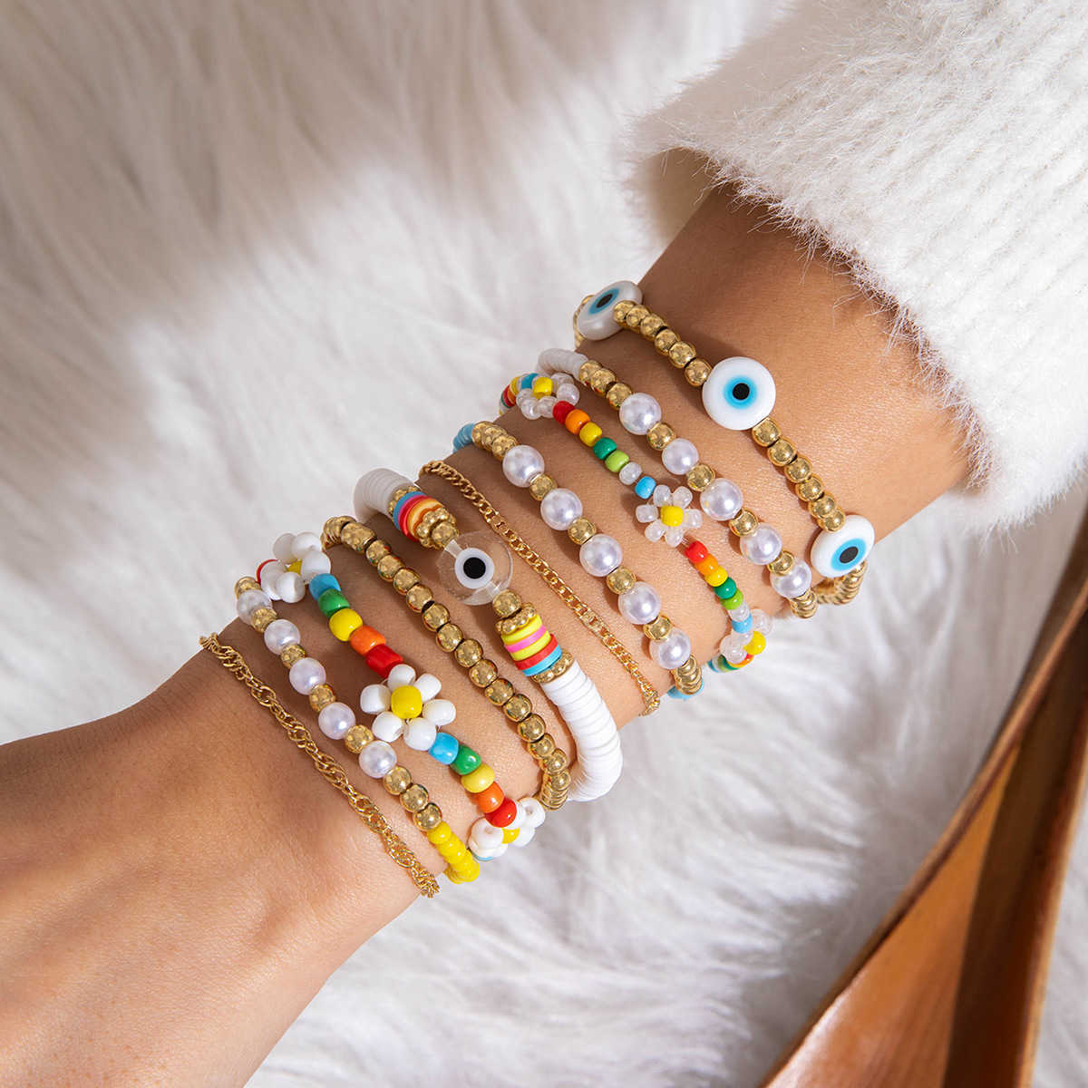 Charm Bracelets Bohemian style colorful rice bead eye ten piece bracelet dopamine elastic bracelet set for women H25220