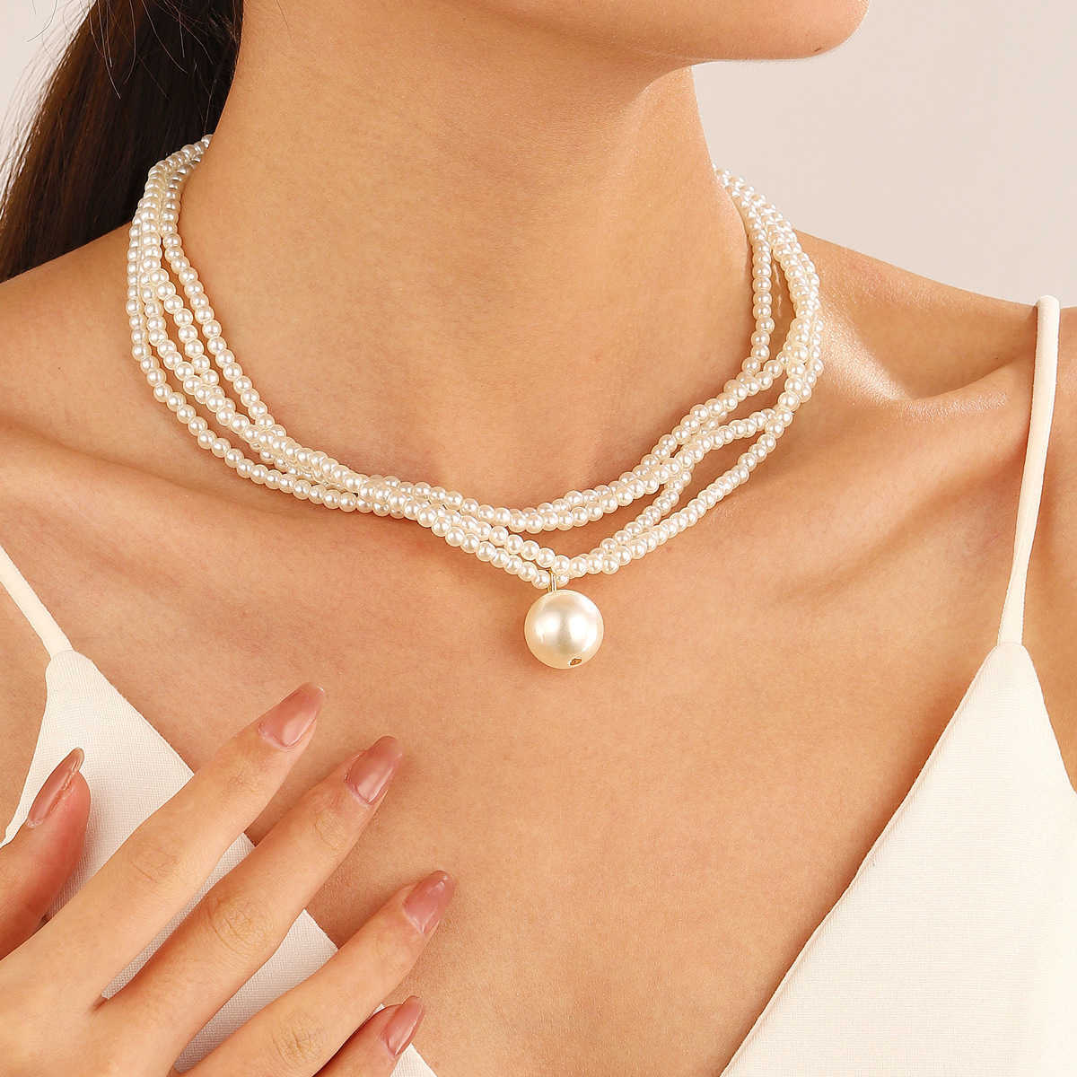 Pendant Necklaces New multi-layer pearl jewelry set with female Instagram style creative design and V-shaped collar bracelet set H25219