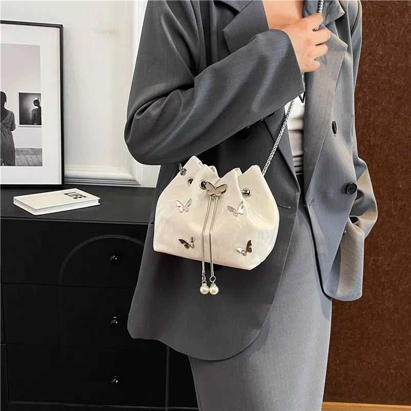 2025 Spring Ladies Crossbody Bag Pleated Drstring Butterfly Pearl Women Shoulder Bag Fashion Metal Chain Bucket Messenger Bag Y250218
