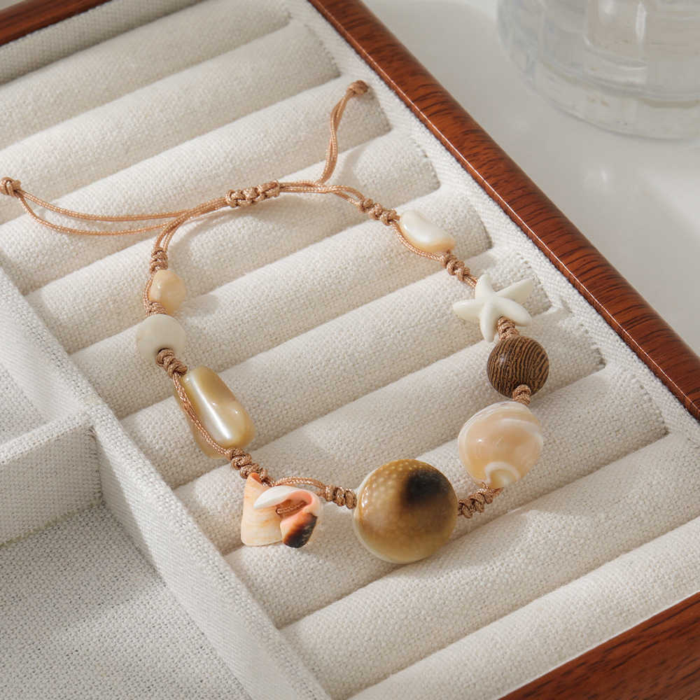 Charm Bracelets Seaside vacation collarbone chain Bohemian style handmade pendant woven rope exotic style natural shell necklace accessories H25220 1 
