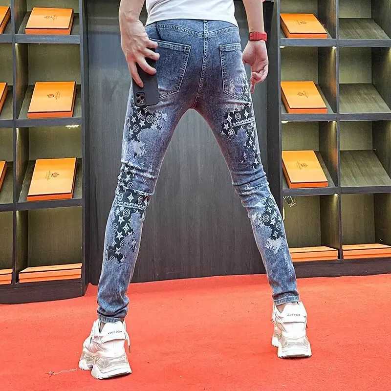 2023 Mens Skinny Jeans Brand Graffiti Printed Jeans Mens Spring Summer Personality Wash Elastic Slim Man Small Foot Denim Pants X250220