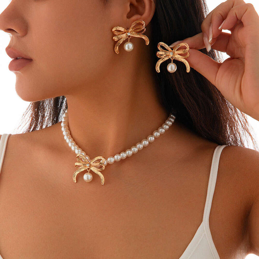 Jewelry fashion imitation pearl bead necklace set, light style alloy bow collarbone chain