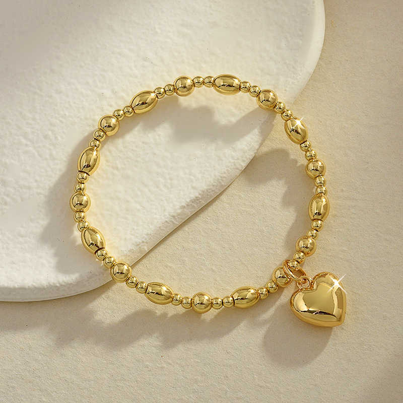 Charm Bracelets Peach Heart Round Bead Bracelet Fashionable Personalized Trendy Handpiece Gold Plated Solid Love Elastic Bracelet H25220