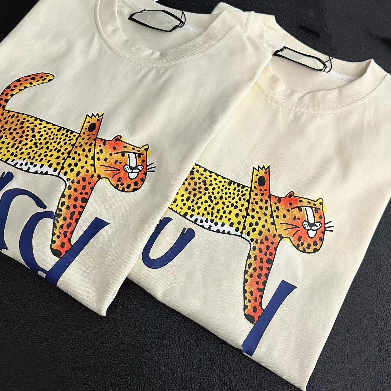 designer t shirts Women's T-Shirt Casual T-shirt Cartoon printed short sleeved T-shirt for men and women M-XL top quality