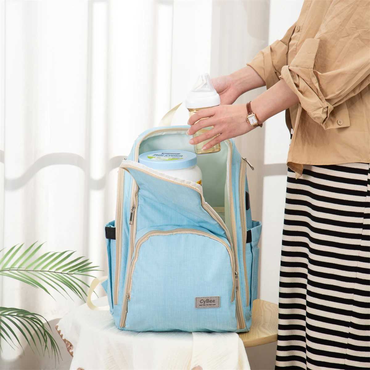 Fashionable waterproof fabric shoulder mommy bag Large capacity double zipper fully open moms bag Multi functional backpack X250220