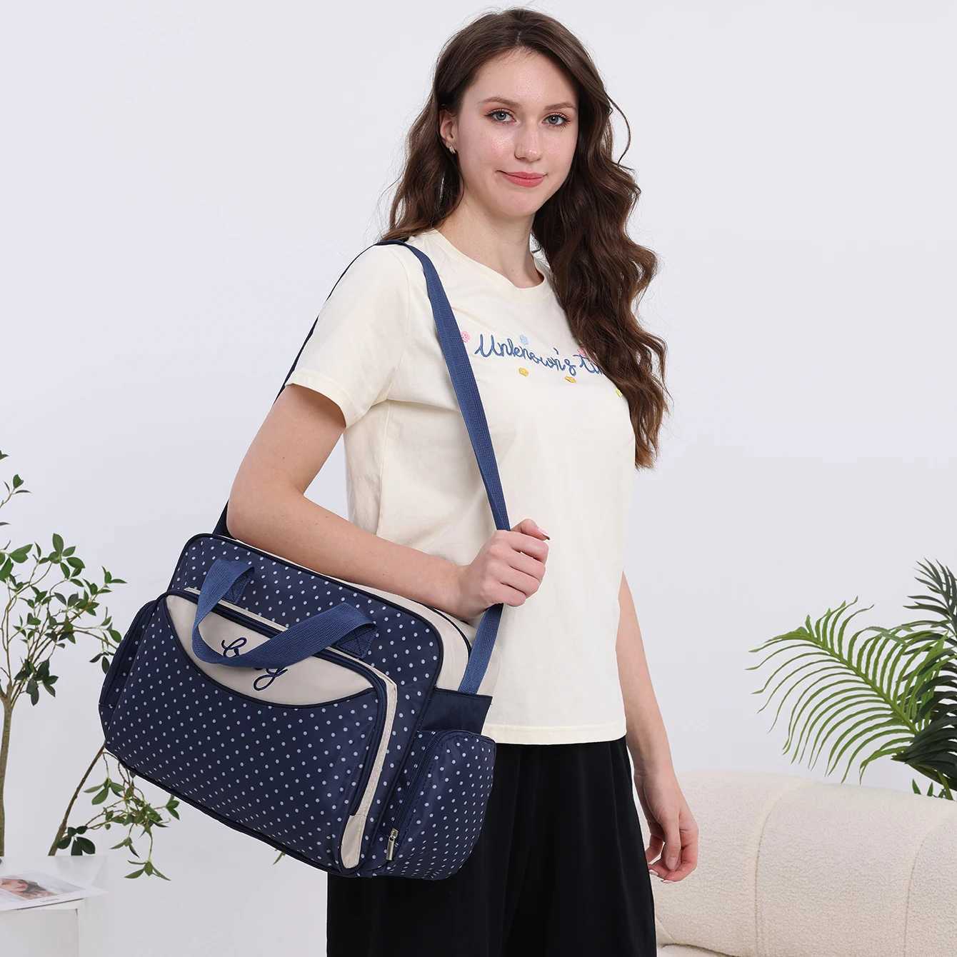Fashion large capacity multifunctional Mommy bag Going out portable mother-and-baby bag hand of Lading shoulder diaper bag X2502201