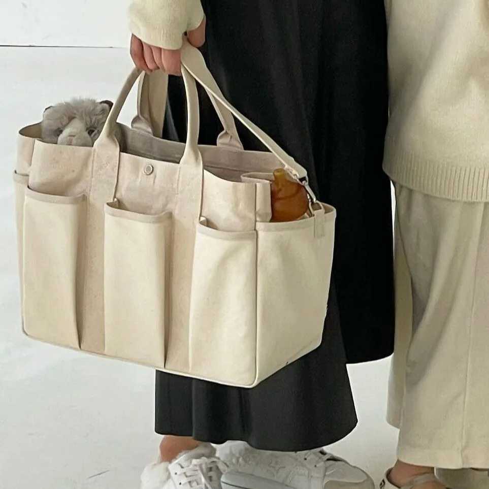 Niche Design Mom Bag New Multi functional Large Capacity Mom Bag Lightweight and Portable Outdoor Carrying Mom Bag X250220