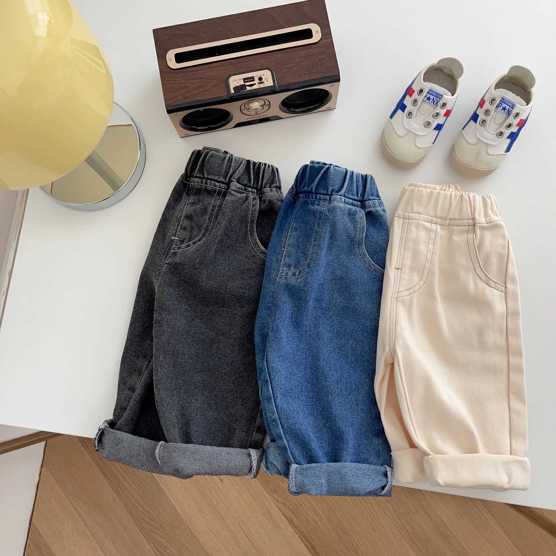 Childrens Solid Jeans 0-5y Baby Autumn Childrens Boys Simple Soft Casual Pants Girls Baby Pockets Loose Fashion Trouser Baby Dungari Z250220