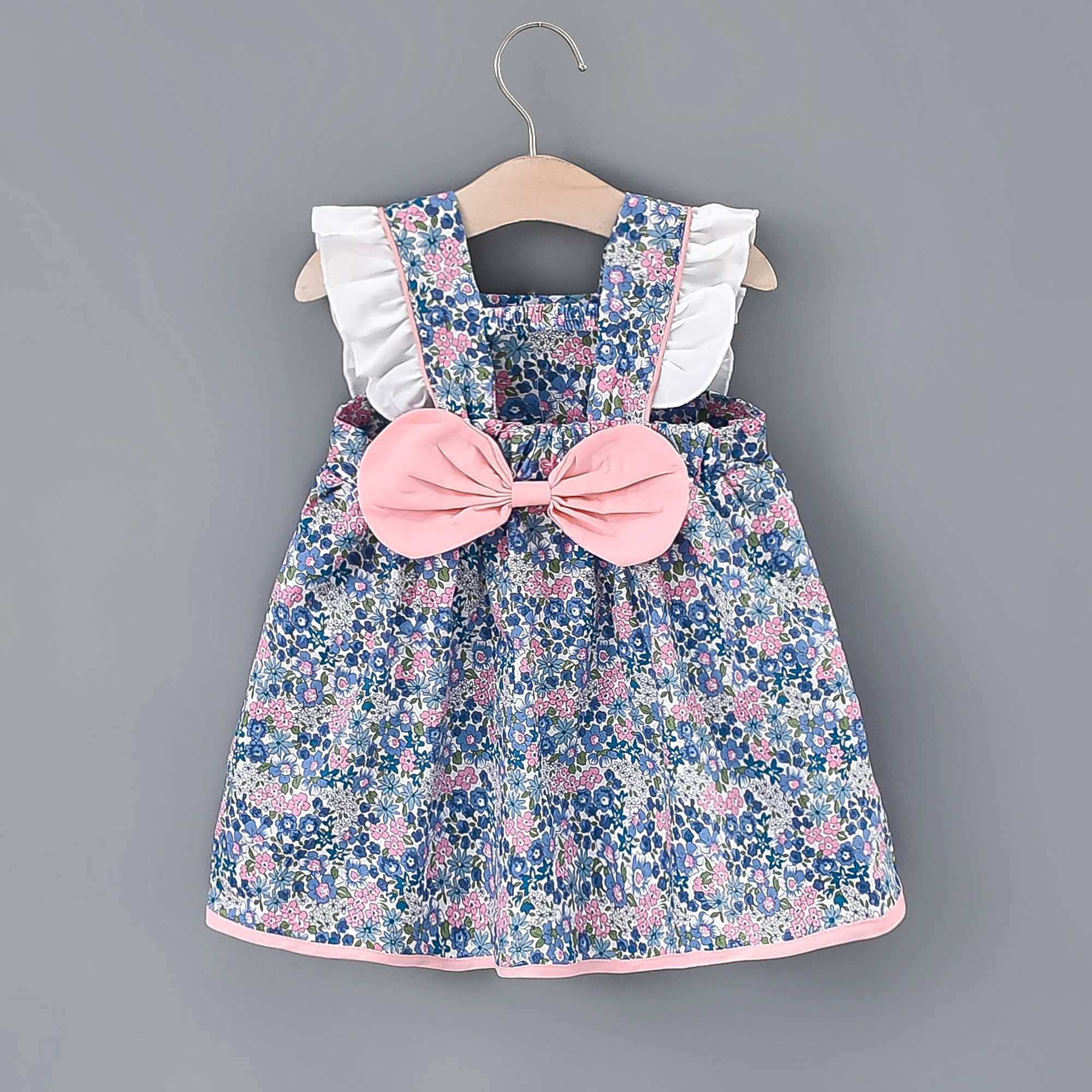 Baby girl floral printed princess dress with white lace on the side and a large bow on the back X250220