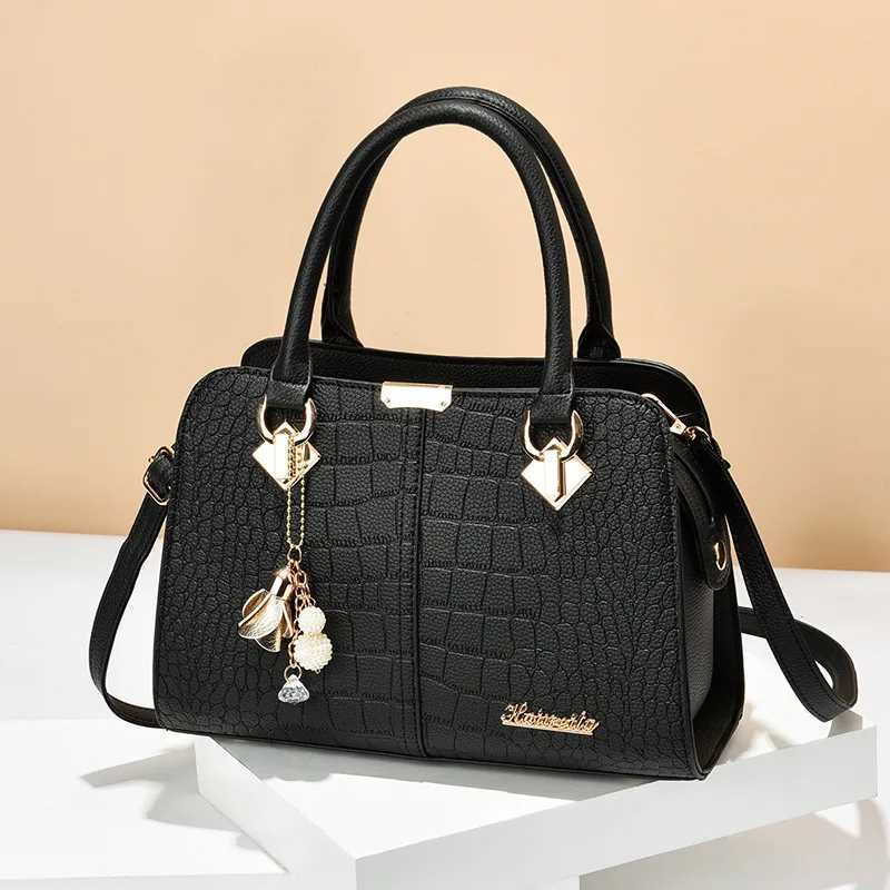 Luxury handbag womens shoulder bag cross body bag with tassel hanger large capacity stone pattern printed handbag Z250220