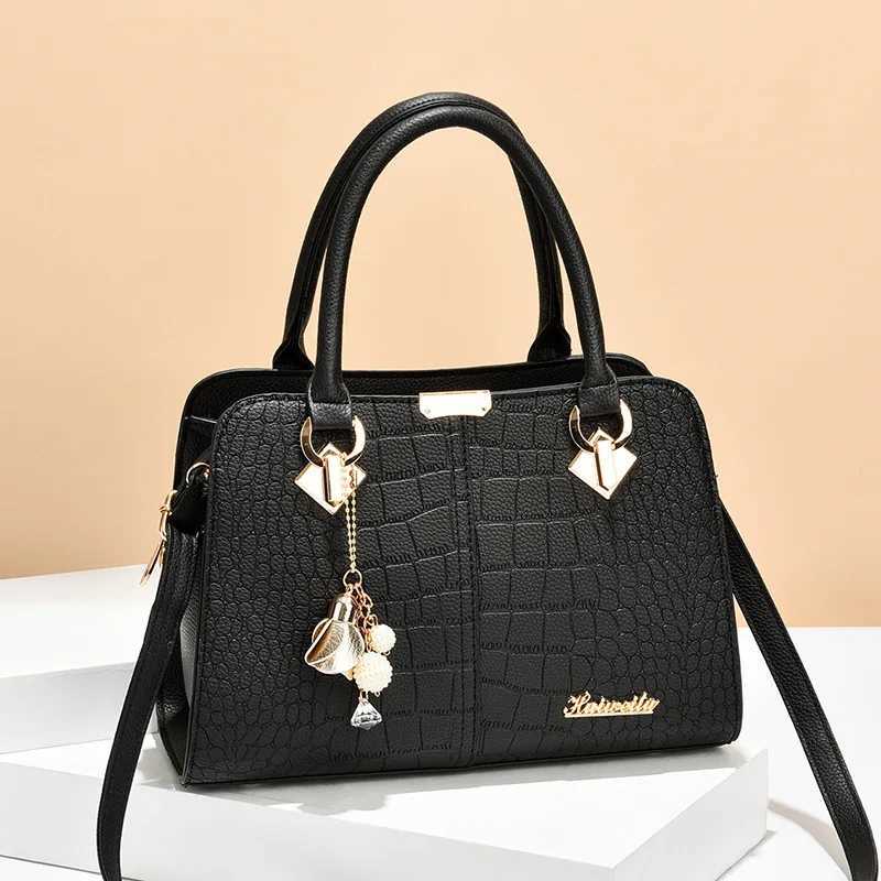 Luxury handbag womens shoulder bag cross body bag with tassel hanger large capacity stone pattern printed handbag Z250220