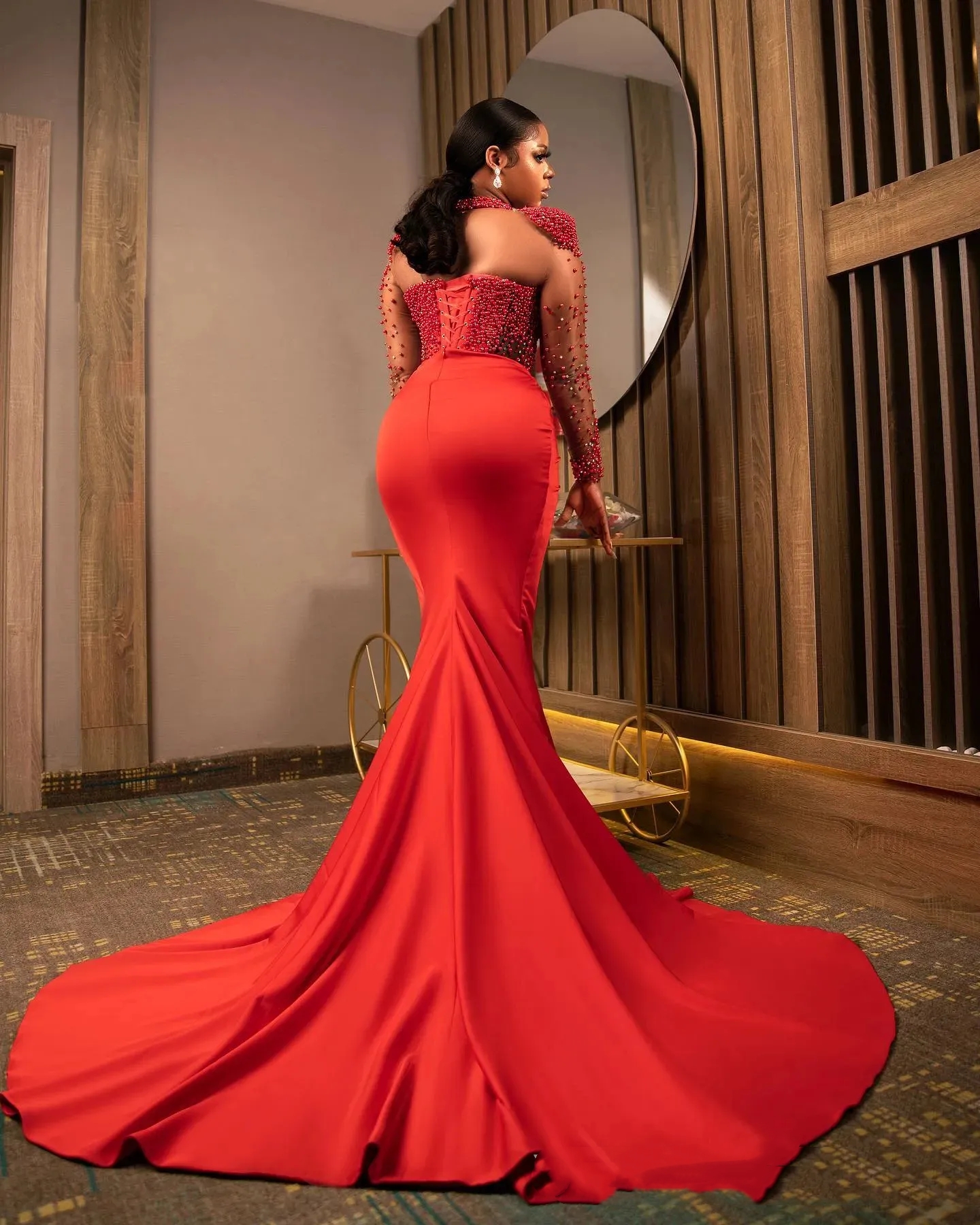 2025 African Red Mermaid Prom Dresses Pearls Beaded Long Sleeves Corset Formal Evening Gowns Transparent Jewel neck Side High Split Sexy Pageant Dress