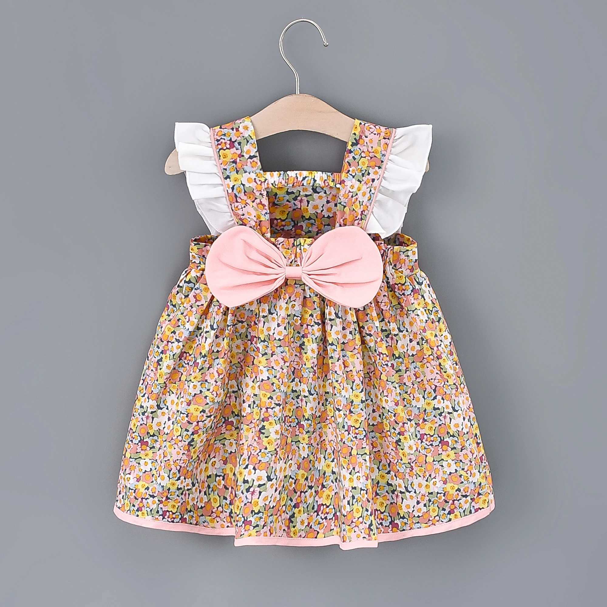 Baby girl floral printed princess dress with white lace on the side and a large bow on the back X250220