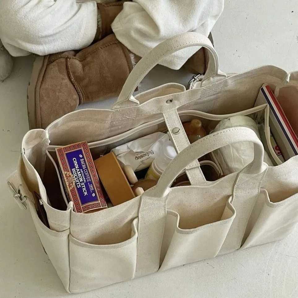 Niche Design Mom Bag New Multi functional Large Capacity Mom Bag Lightweight and Portable Outdoor Carrying Mom Bag X250220
