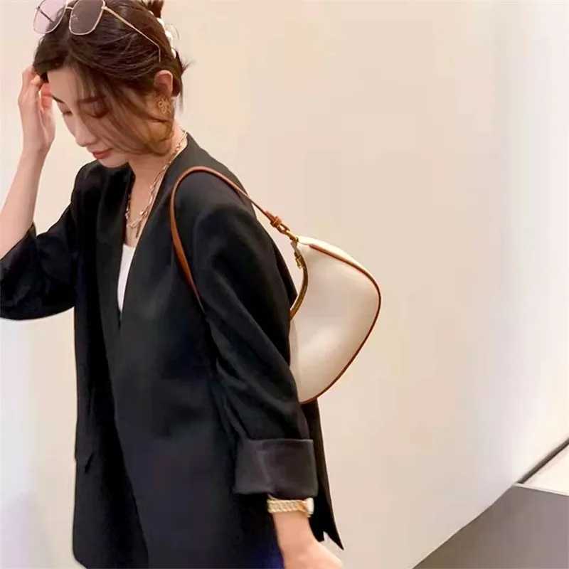 New Arrival CluTCh handbag solid color leather armpit shoulder bag casual womens bag shopping handbag luxury homeless bag T250318