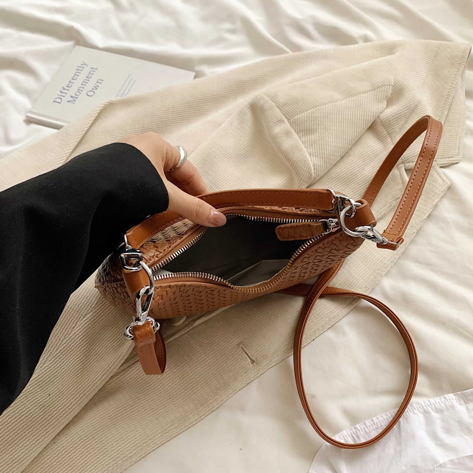 Womens lightweight soft leather woven arm bag new Versatile handheld garbage bag for autumn 2024 high-end horizontal bag Y250319