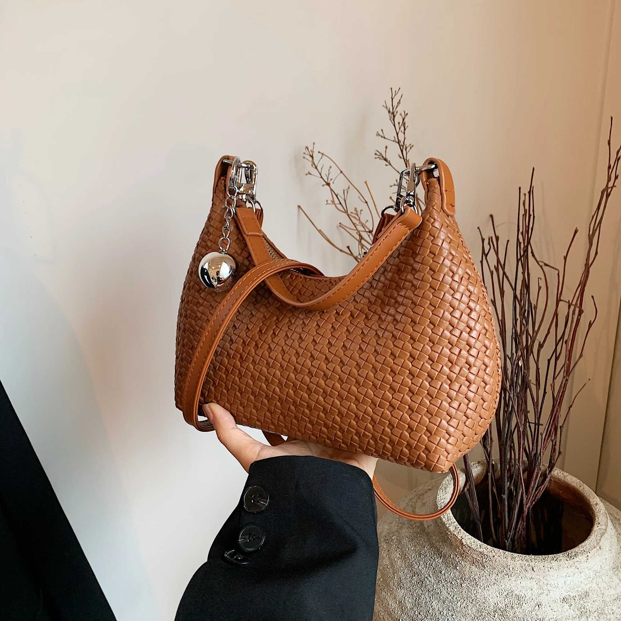 Womens lightweight soft leather woven arm bag new Versatile handheld garbage bag for autumn 2024 high-end horizontal bag Y250319
