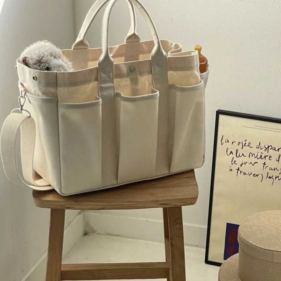 Niche Design Mom Bag New Multi functional Large Capacity Mom Bag Lightweight and Portable Outdoor Carrying Mom Bag X250220