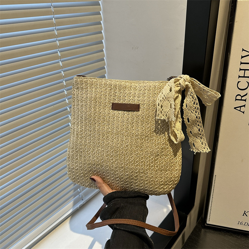 Trendy casual beach weaving 2025 personalized silk scarf new fashion and western-style grass woven bucket shoulder crossbody bag for women swissmilita