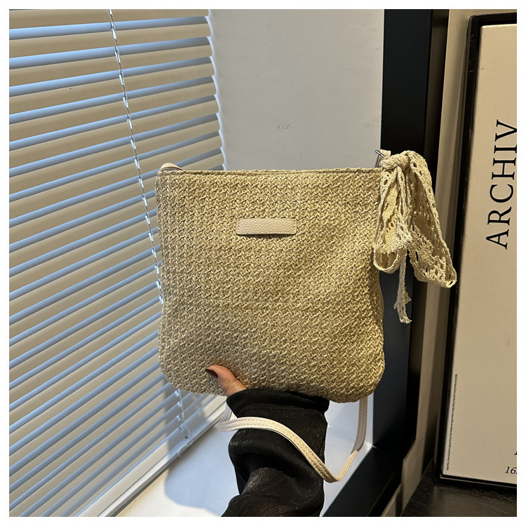 Trendy casual beach weaving 2025 personalized silk scarf new fashion and western-style grass woven bucket shoulder crossbody bag for women swissmilita