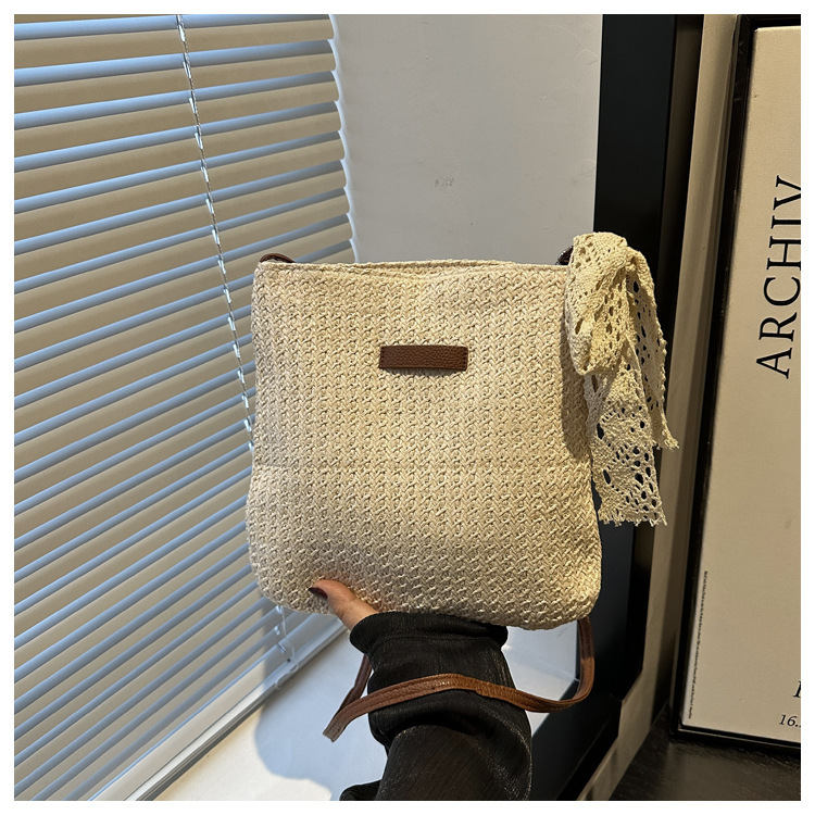 Trendy casual beach weaving 2025 personalized silk scarf new fashion and western-style grass woven bucket shoulder crossbody bag for women swissmilita