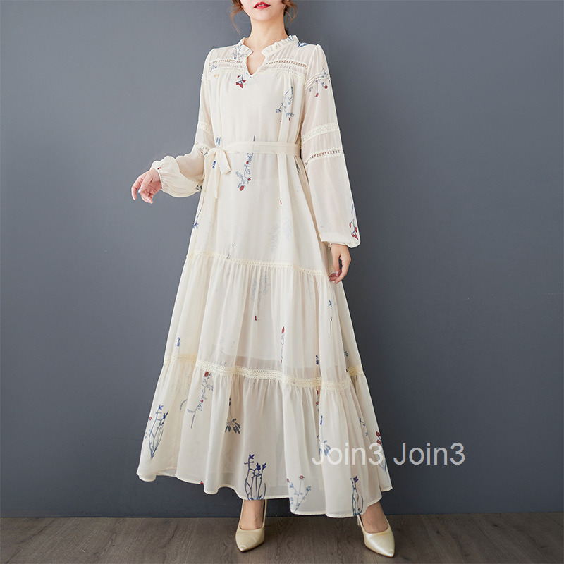 Spring and Autumn loose artistic fashion printed long sleeved patchwork pleated temperament versatile mid length dress