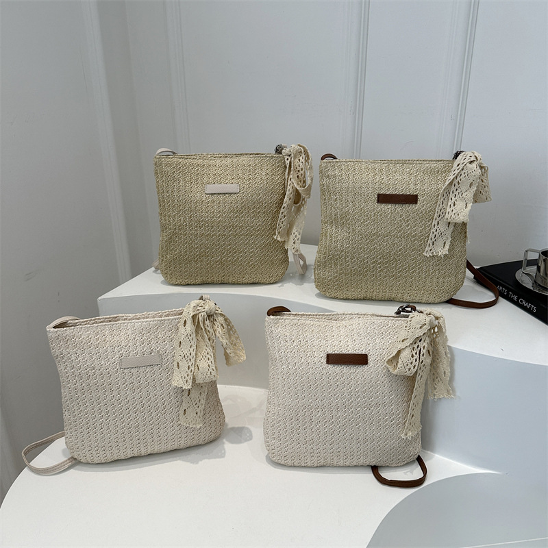 Trendy casual beach weaving 2025 personalized silk scarf new fashion and western-style grass woven bucket shoulder crossbody bag for women swissmilita
