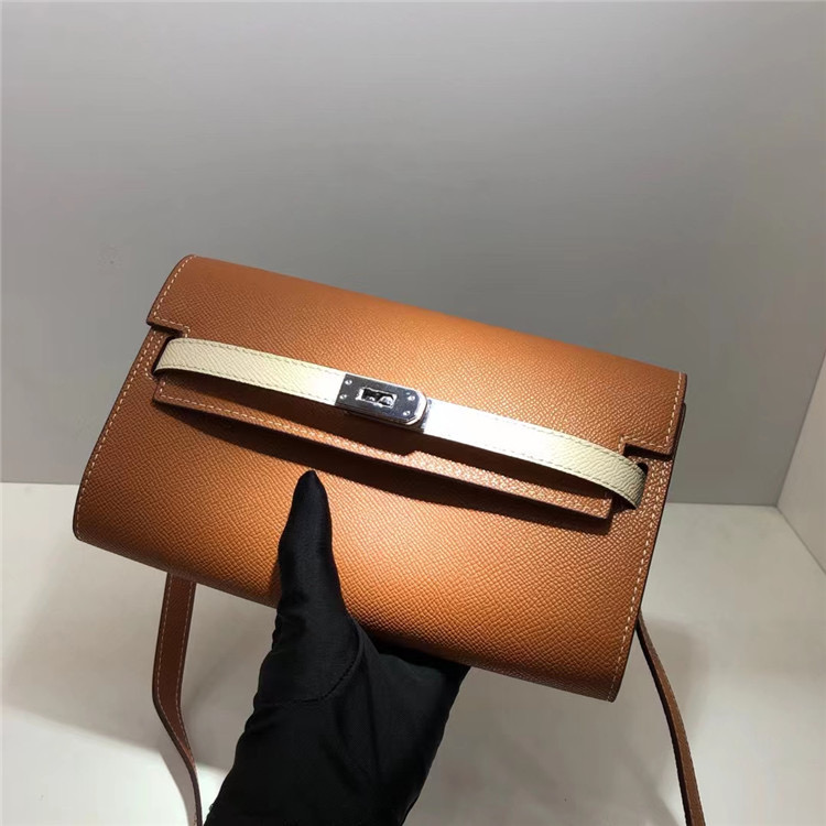 The first layer of cowhide clutch makeup bag leather headphones lipstick storage wallet womens large capacity wallet