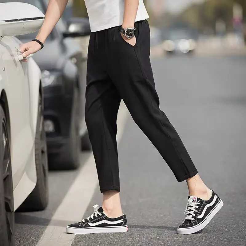 New Checkered Fashion Europe and the United States Style Mens Pants Business Casual Travel Slim Pants Comfortable and Versatile W250225