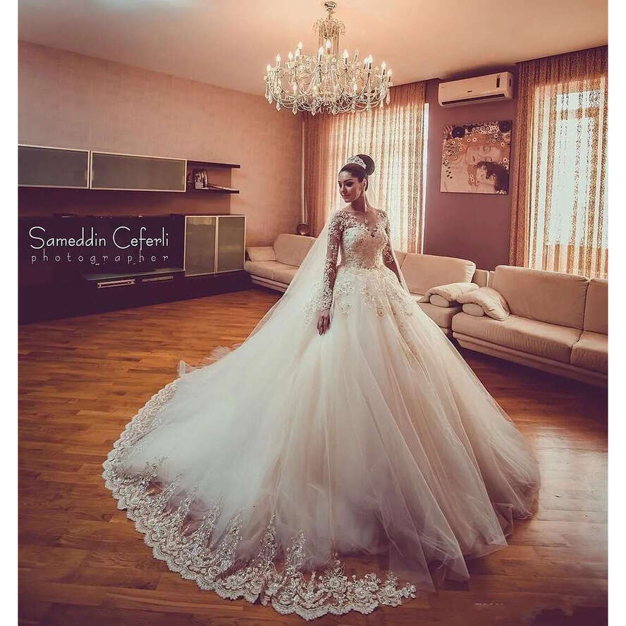New Modern Sexy Arabic Long Sleeves A E Wedding Dresses Illusion Lace Appliques Crystal Beaded Tulle Plus Size Formal Bridal Gowns
