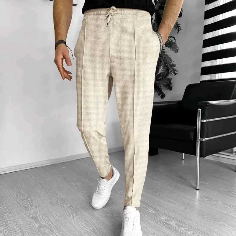 2024 Spring and Fall mens Waffle Leisure sports solid color pants trend fashion high quality drawstring small leg pants W250225