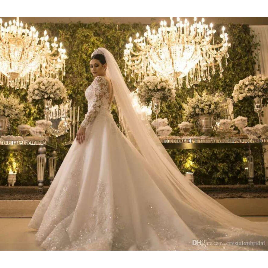 Arabic New Long Sleeves A E Wedding Dresses Jewel Neck Lace Appliques Crystal Beaded Sheer Back Chapel Train Plus Size Bridal Gowns