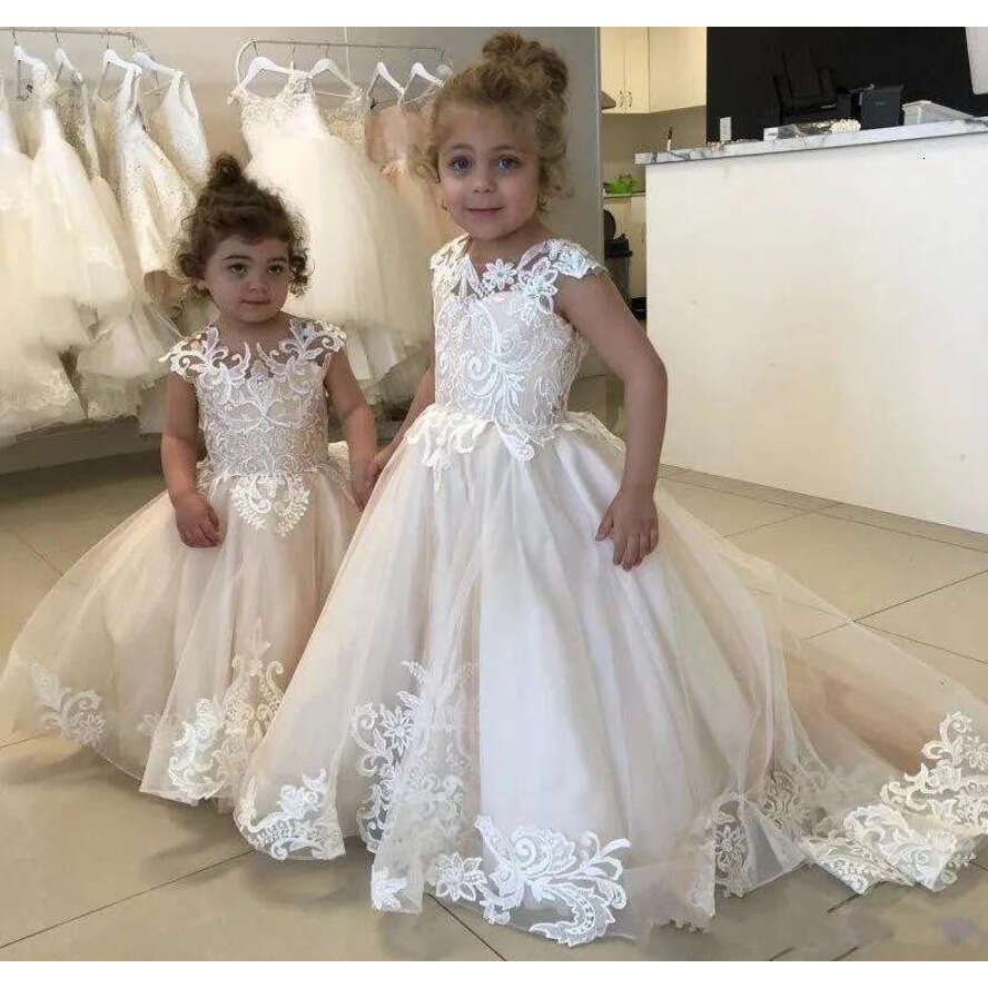 New Princess Wer Girls Dresses For Weddings Sheer Jewel Neck Tulle Appliques Cap Sleeves Open Back Birthday Children Pageant Gowns