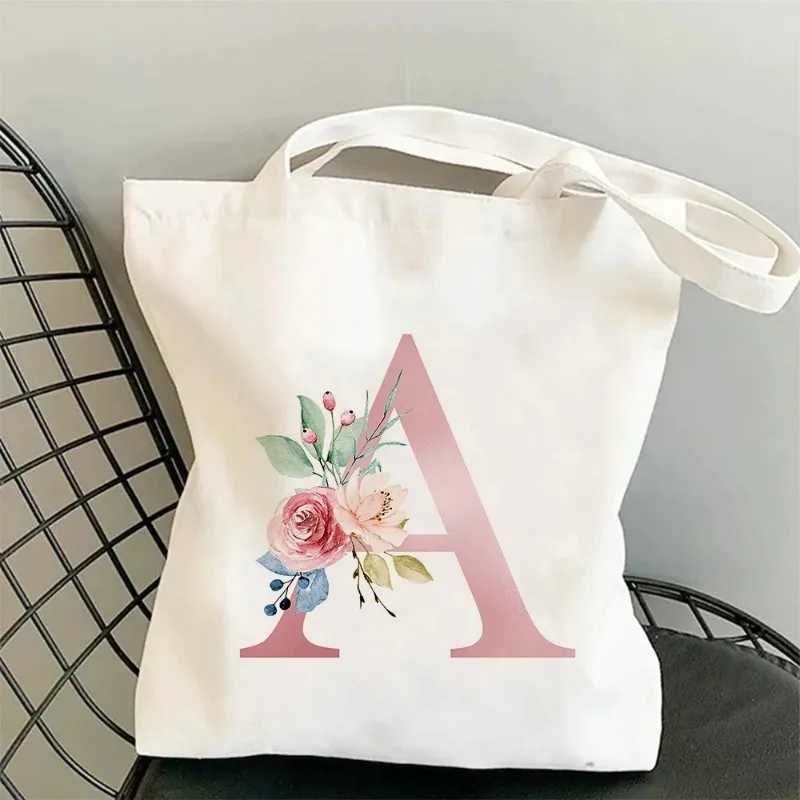 Flower letters A-Z womens shopping handbag canvas large capacity student toilet organizer casual handbag Z250224