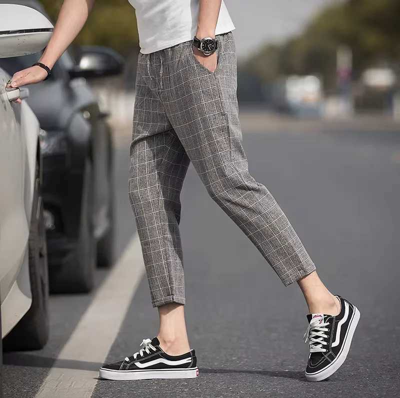 New Checkered Fashion Europe and the United States Style Mens Pants Business Casual Travel Slim Pants Comfortable and Versatile W250225