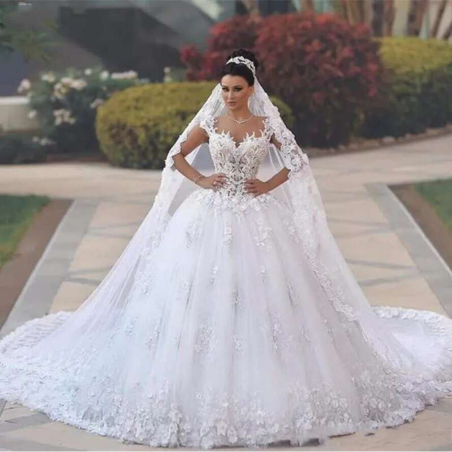 New Cheap A E Wedding Dresses Sweetheart Cap Sleeves Lace Appliques Wers Court Train Ball Gown Puffy Tulle Arabic Formal Bridal Gowns