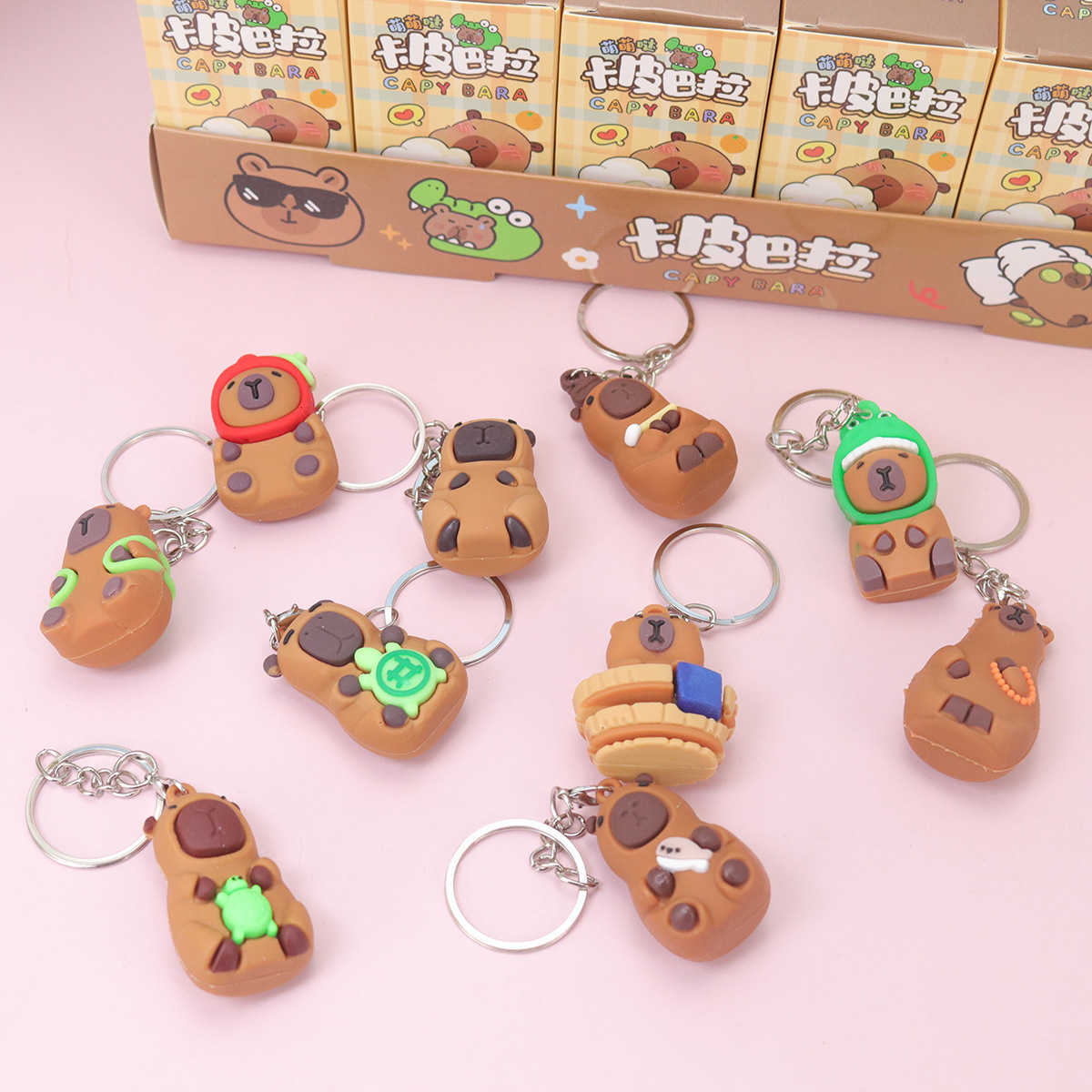 24 boxes of Capibala blind box figurine pendant cute keychain Dongdongle elementary school toy student award Free shipping