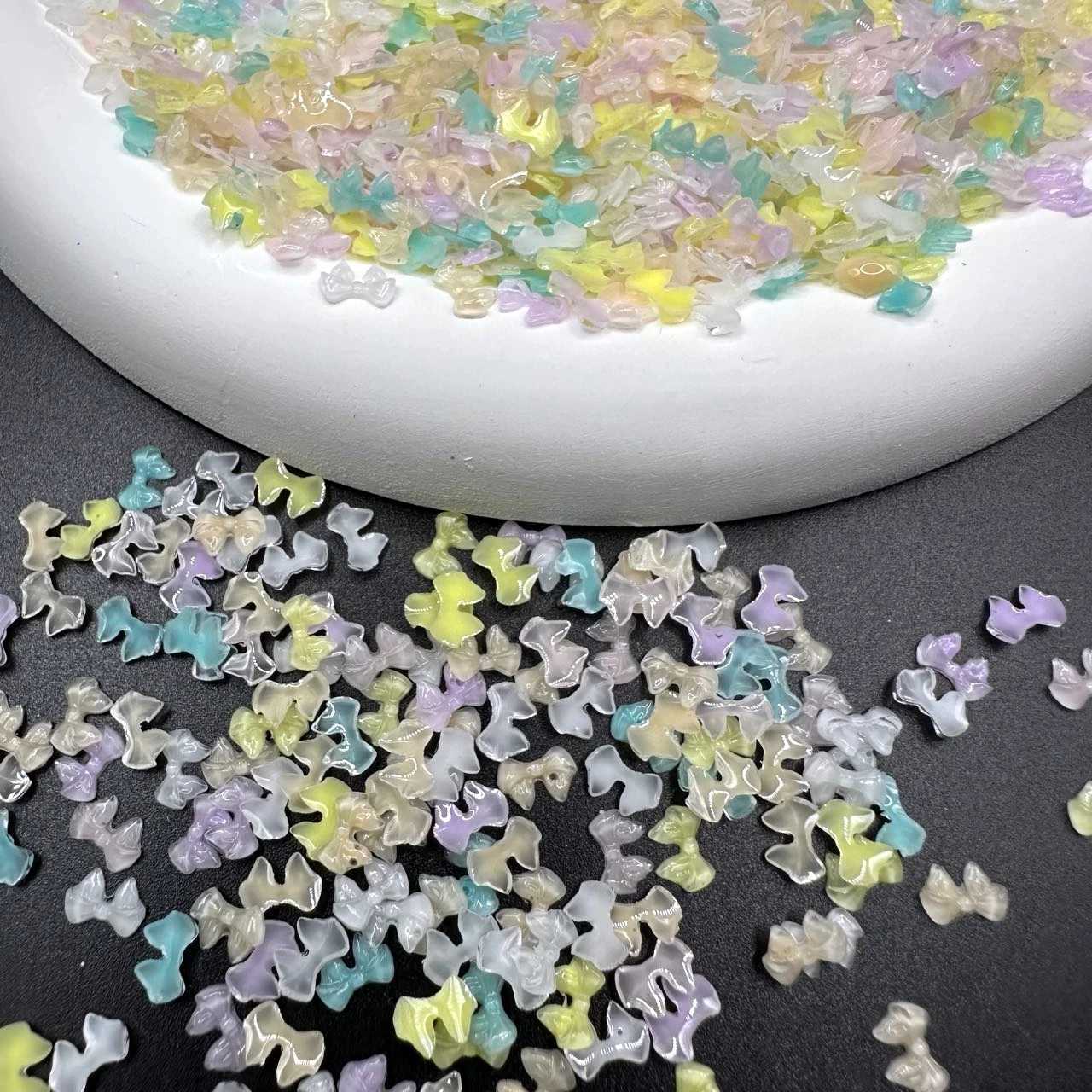 Nail Art Decorations 50pcs Transparent Bow Nail Art Parts Charms Bulk Shiny Mini Resin Ribbon Nail Rhinestones DIY Summer Nail Art Decor Accessories C