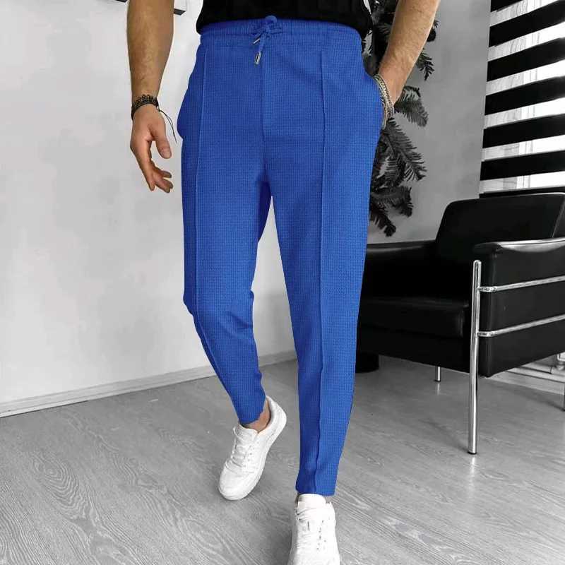 2024 Spring and Fall mens Waffle Leisure sports solid color pants trend fashion high quality drawstring small leg pants W250225